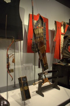 The small bow on the left was designed to be used from inside a palanquin. To the right is a normal Japanese longbow..